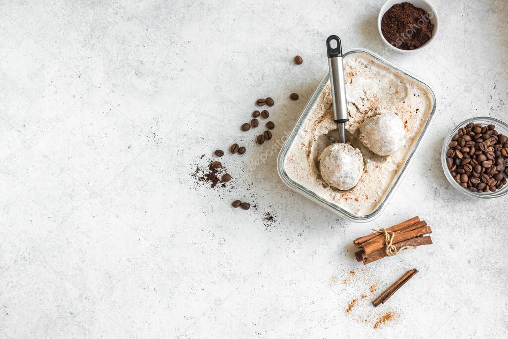 Coffee Ice Cream, top view, copy space. Homemade ice cream with coffee and cinnamon.
