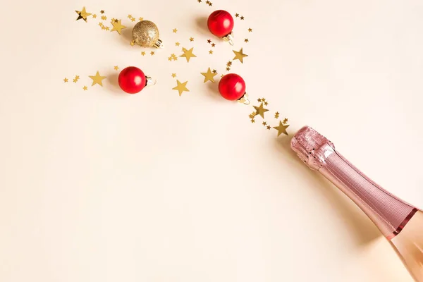 Christmas Composition Champagne Bottle Festive Balls Golden Confetti Stars Light — Stock Photo, Image