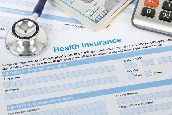 Health insurance application form with stethoscope and calculato — Stock Photo, Image