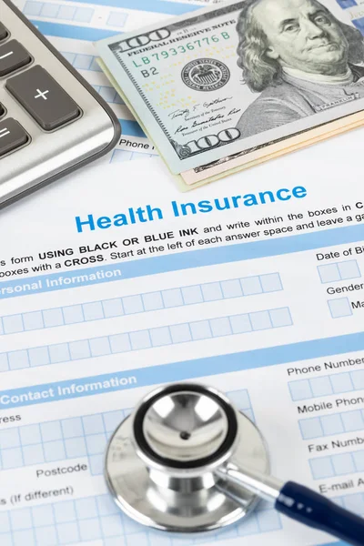 Health insurance application form with stethoscope and calculato — Stock Photo, Image