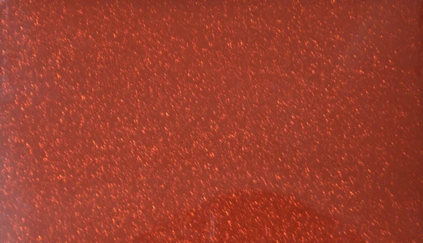 Red glossy plain background. Metallic. Texture Close-up