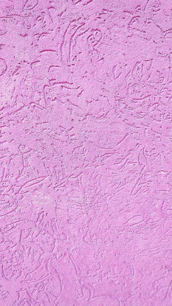 Plaster wall painted in light violet paint. Close-up.