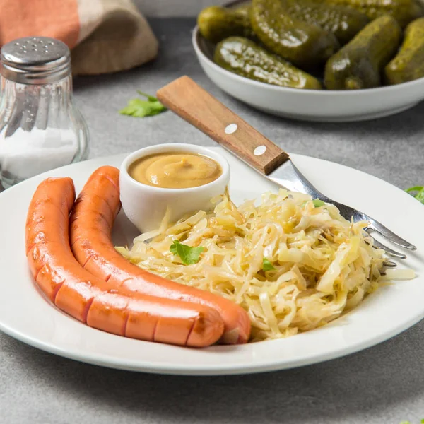 Stewed White Cabbage Two Long Fried Sausages Mustard Pickled Cucumbers — Stock Photo, Image