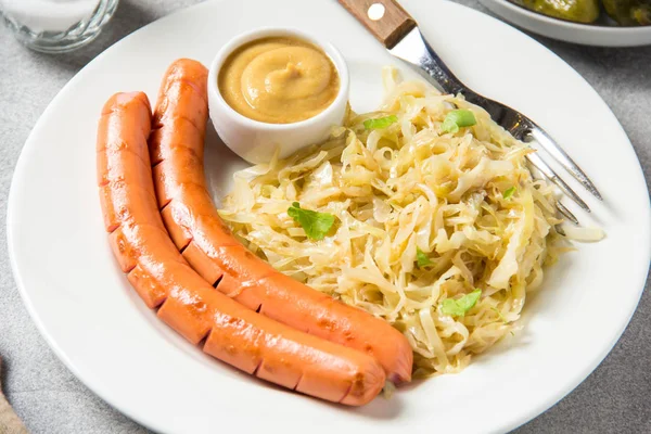 Stewed White Cabbage Two Long Fried Sausages Mustard Pickled Cucumbers — Stock Photo, Image