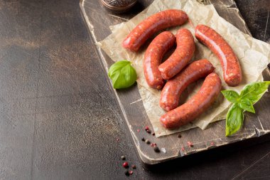 Raw grilled sausages with meat (beef, pork, lamb) and spices, ho clipart