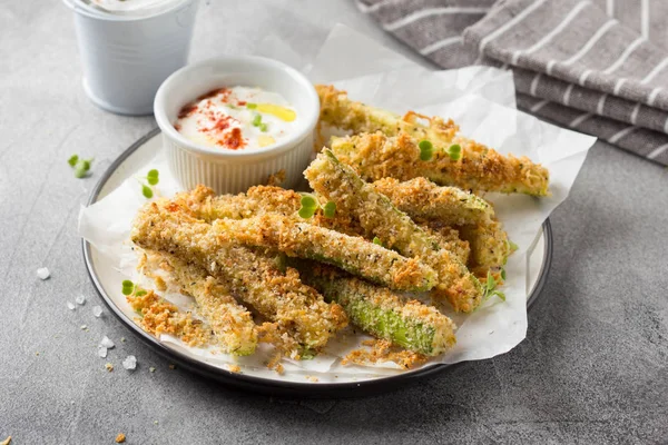 Zucchini sticks in breadcrumbs, with cheese, herbs, breadcrumbs — Stock Photo, Image