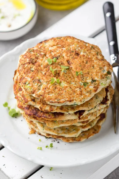 Chicken pancakes with zucchini and herbs, stack of cutlets on pl — Stock Photo, Image