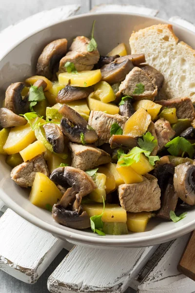 Roast meat (pork, beef) with potatoes, zucchini and mushrooms. A — Stock Photo, Image