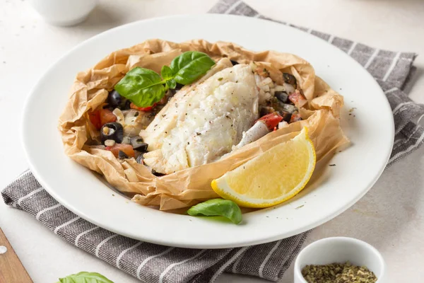 Fillet of white fish (Pollock, cod, sea bass, Dorada) with olive — Stock Photo, Image
