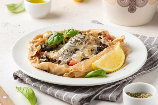 Fillet of white fish (Pollock, cod, sea bass, Dorada) with olive — Stock Photo, Image