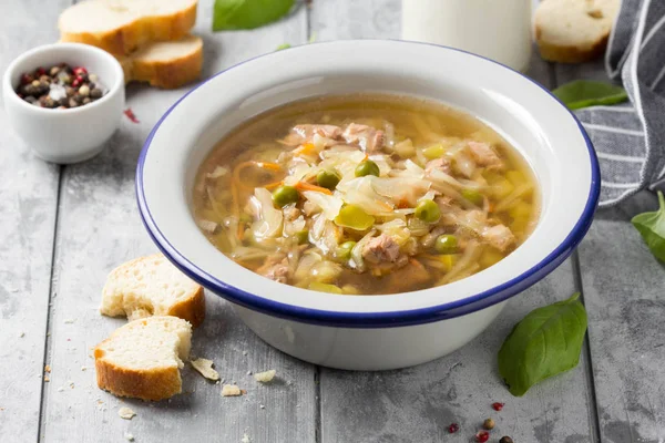 Vegetable soup with cabbage, meat, potatoes, zucchini, carrots, — Stock Photo, Image