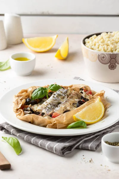 Fillet of white fish (Pollock, cod, sea bass, Dorada) with olive — Stock Photo, Image