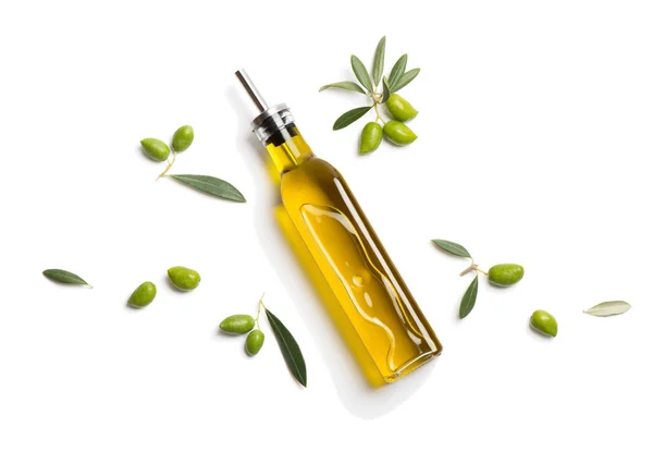 Olio in bottiglia e olive fresche. Vista sopra . Fotografia Stock