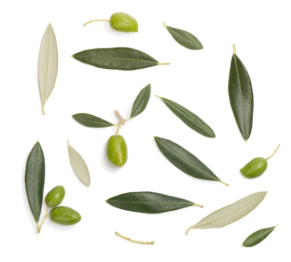 Green olives and leaves. Top view. Stock Photo