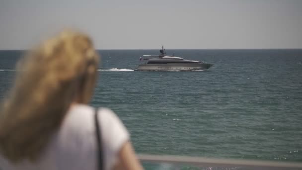 Girl Shoots Boat Sea — Stock Video