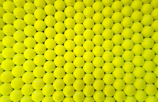 large group of tennis balls as background