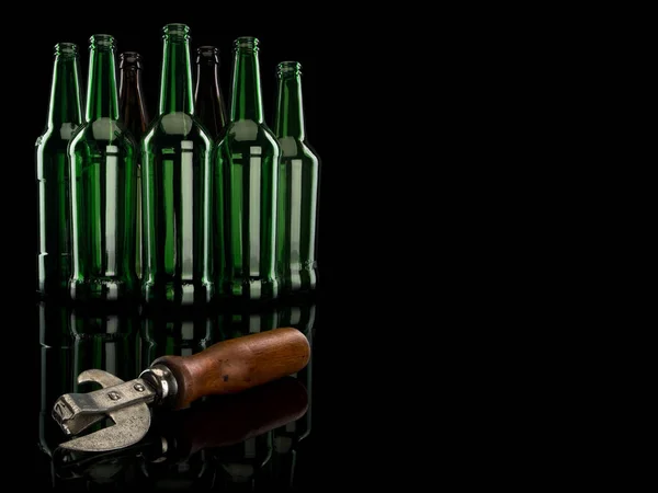 Old Can Opener Group Empty Beer Bottles Isolated Black — Stock Photo, Image