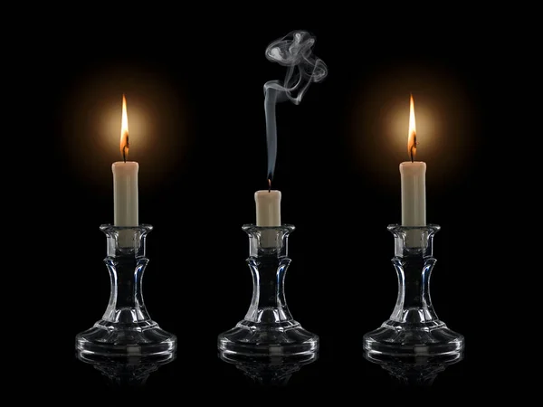 Due Bruciore Una Candela Spenta Candelabri Vetro Isolato Sul Nero — Foto Stock