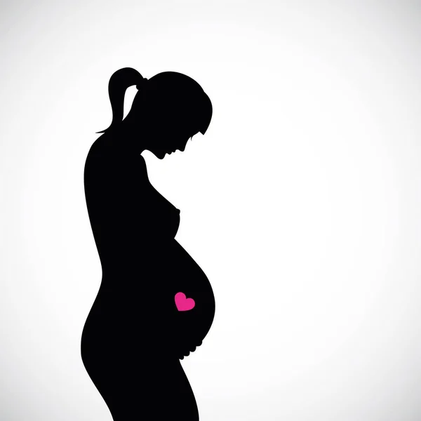 孕妇剪影粉红色的心脏 — 图库矢量图片