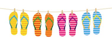 clothespins ile bağlı bir satırındaki asmak çizgili flip flop