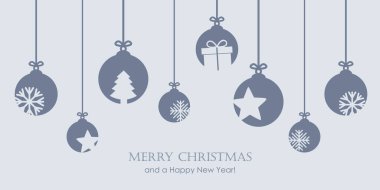 Kar taneleri, yıldızlar ve hediyelerle süslü Noel süslemeleri.