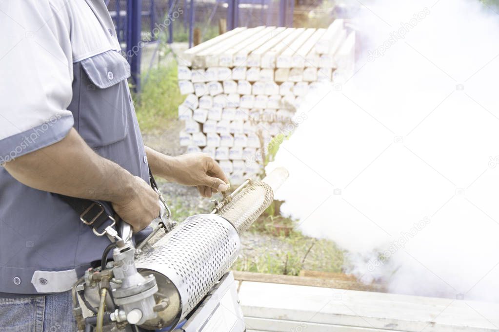 Man are spraying mosquitoes to get rid of mosquitoes causing dengue fever.