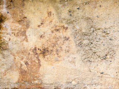 Beton doku Kil, taş ve kum pas arka plan ile beton ped sıkışmış.