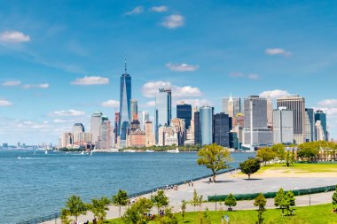Lower Manhattan and Governors Island on a sunny day clipart
