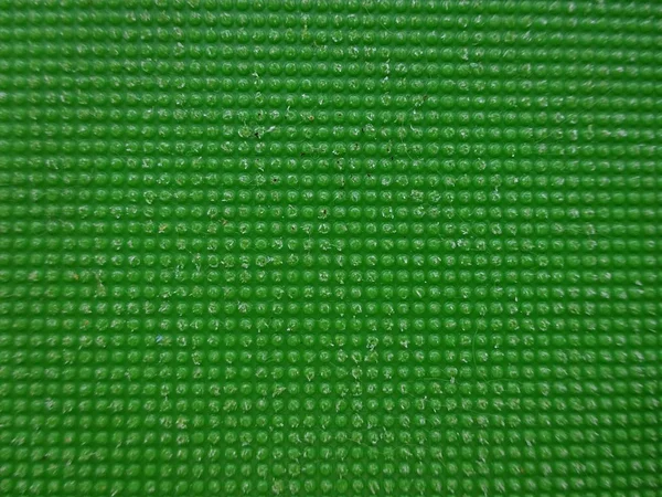 Green color textured plastic bubble ribbed texture surface background