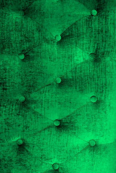 skin of structure. upholstery. background. green. emerald.