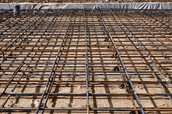 Reinforced Foundation for pouring concrete in the construction of a house on a plot of land.