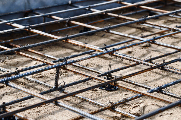 Reinforced Foundation for pouring concrete in the construction of a house on a plot of land.