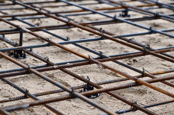 Reinforced Foundation for pouring concrete in the construction of a house on a plot of land.