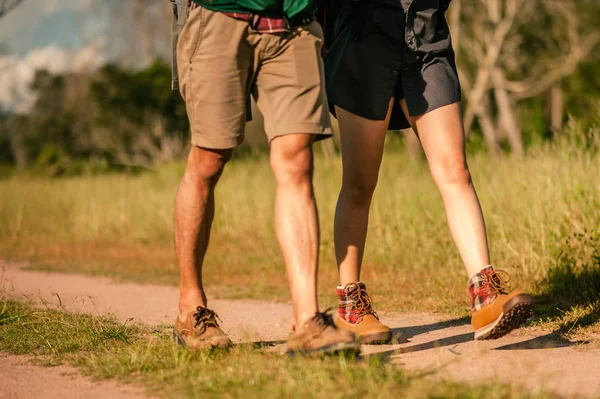 Hikers Backpacks Walking Trough Forest Path Wearing Mountain Boots Focus — Stock Photo, Image