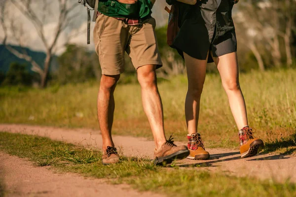 Hikers Backpacks Walking Trough Forest Path Wearing Mountain Boots Focus — Stock Photo, Image