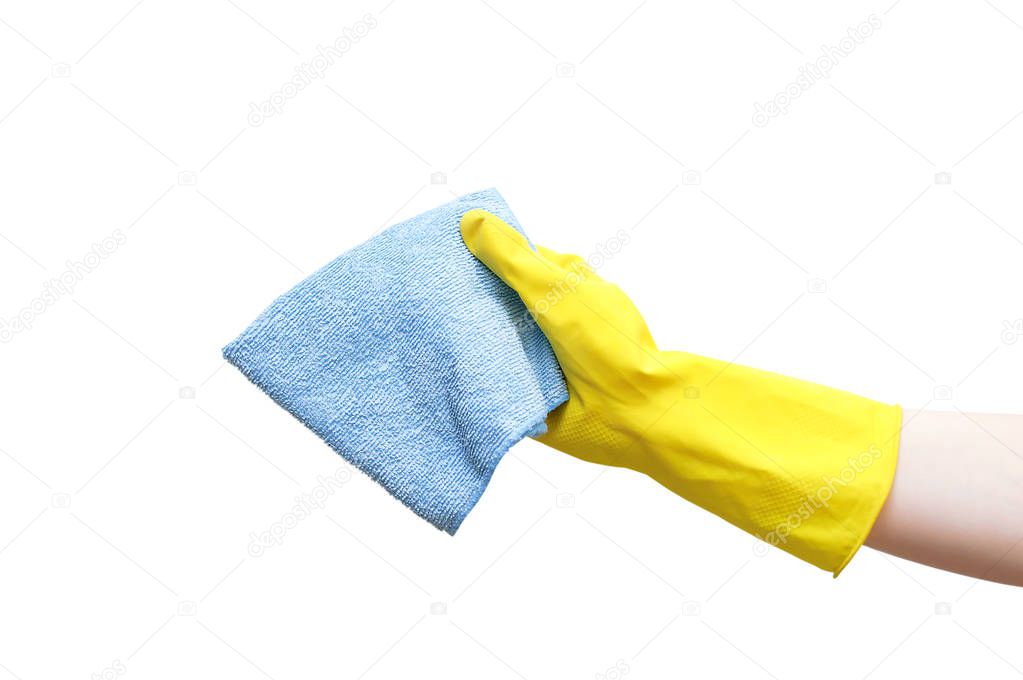 A hand in yellow rubber gloves holds a blue rag for cleaning. White isolate. Close-up.