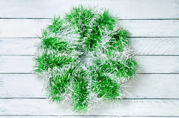 Christmas Wreath Shiny Tinsel White Wooden Background — Stock Photo, Image