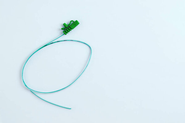 Urological catheter close-up on a white background. View from above.