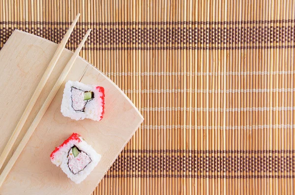 Two Rolls Crab Meat Wooden Board Bamboo Mat — Stock Photo, Image