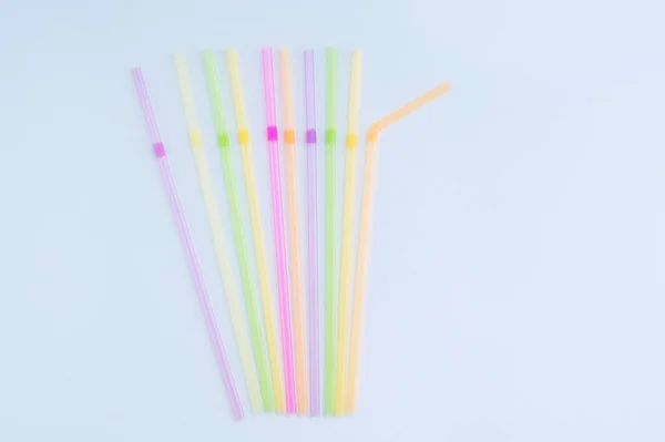 Plastic Multicolored Cocktail Tubes Lying White Background — Stock Photo, Image