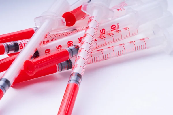 1ml insulin syringes on a white background. — Stock Photo, Image