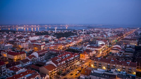 Aveiro, Portugal - August 2018: Heavy traffic in a well illuminated Praia da Barra on a summer night. Royalty Free Stock Photos