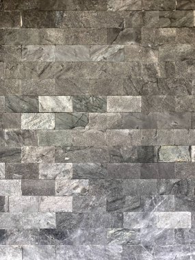 Gümüş ve gri tuğla duvar arka plan olarak