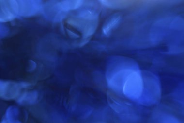 Mavi mavi arka plan yuvarlak elemanları ile. Bokeh etkisi