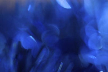 Yuvarlak elemanları ile mavi arka plan. Bokeh