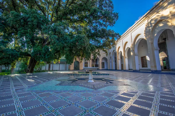 Fes, Morocco - 10.02.2020: The courtyard of Dar Batha Museum in Fez Medina. Former royal palace and museum of national art, ethnography and the cultural activities. Madrasa inside interior — Stock Image Fes Morocco 2020 Courtyard Dar Batha Museum Fez Medina Former Stock Photo