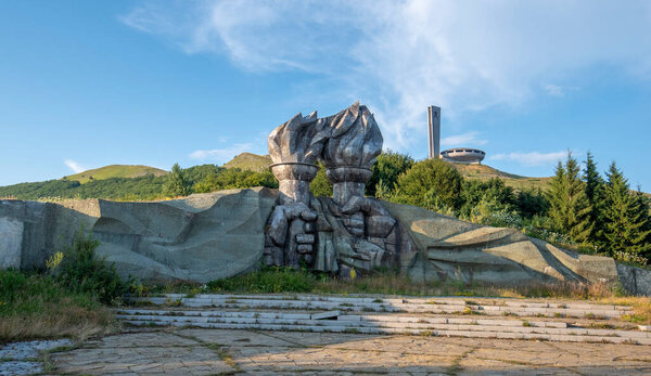 Buzludzha, Bulgaria - July 21 2019 : The Memorial House of the Bulgarian Communist Party sits on Buzludzha Peak. Abandoned communist building in the Balkan mountain