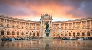 Vienna, Austria - 10.03.2020: Neue Burg Museum complex part of the imperial Palace Hofburg in the center of Wien at sunset. A famous landmark and a popular tourist destination clipart