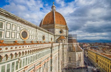 The Duomo in Florence, Italy the Cathedral of Santa Maria del Fiore from the top with beautiful lights at cloudy day in Firenze clipart