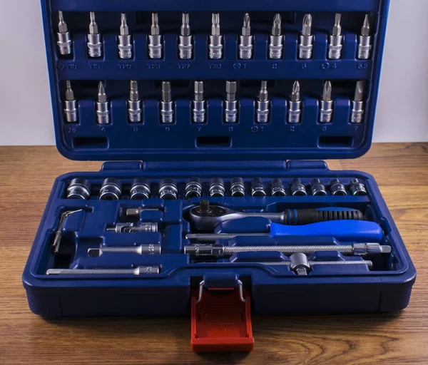 set of tools for car repair work in blue case